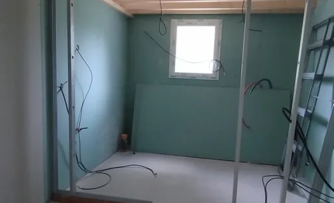 Isolation, doublage, création de cloisons et pose de porte à galandage dans une extension à Fargues-Saint-Hilaire, Fargues-Saint-Hilaire, MD RENOVATION